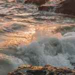 waves crashing on a rocky shoreline