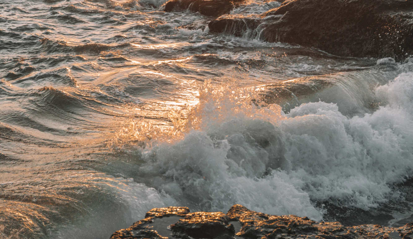 waves crashing on a rocky shoreline